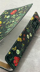 Biblia RVR60 Tamaño manual con broche y asa. Floral sobre negro