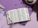 Biblia Portátil 12 puntos RV1960, imit piel flores  con canto floral lila